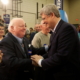 Duffy and Harper shaking hands